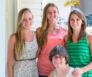 Photo of Nancy and her three daughters.